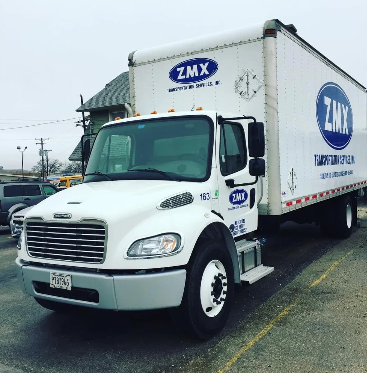 ZMX straight truck parked at the yard
